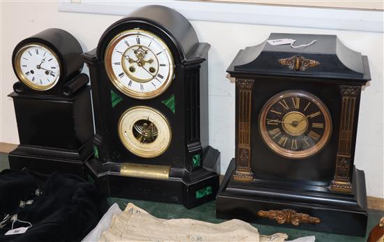 A black slate and green malachite clock, barometer and two other clocks tallest 42cm